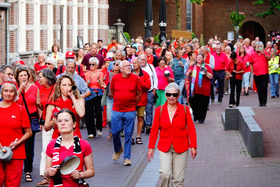 Marchers carrying signs arrive at Arcata Plaza on MLK Day