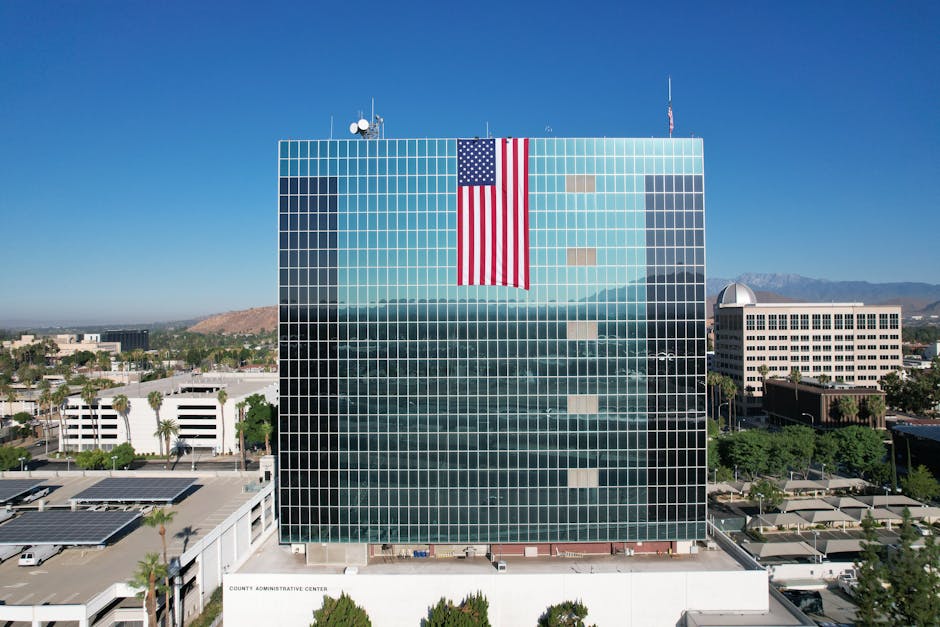 Aerial view of the Riverside County Administrative Center, a California government building with American flag